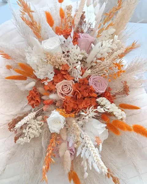 centre de table mariage en fleurs séchées - décoration table d'honneur